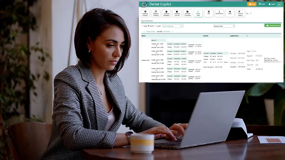 A person using a laptop at a desk